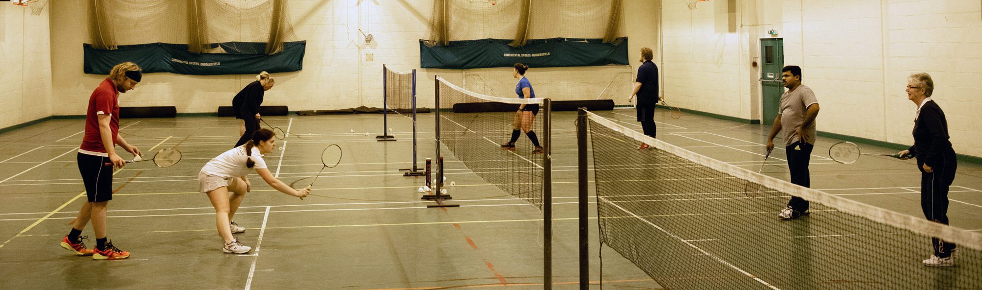 People playing badminton at R.W.P badminton club in Bristol