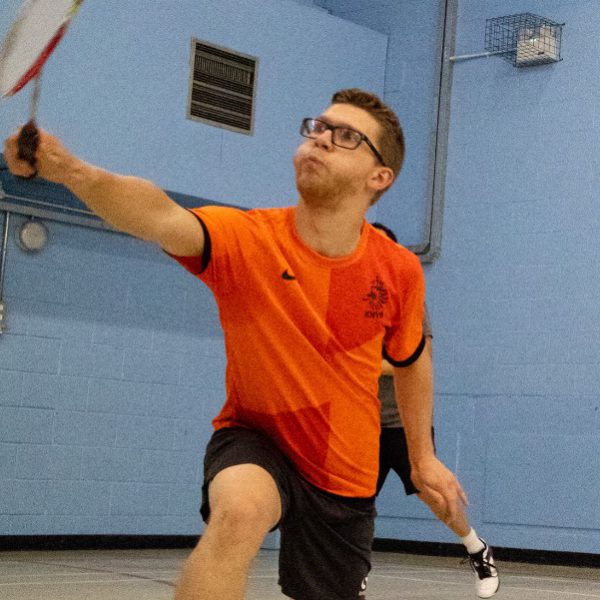 An R.W.P cub member playing badminton