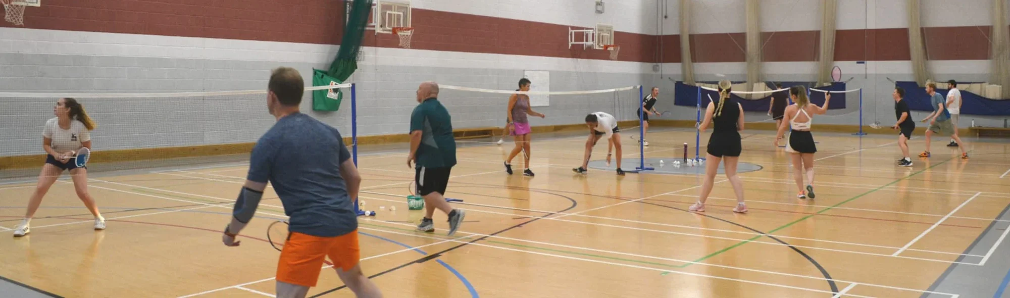 People playing badminton at R.W.P badminton club in Bristol